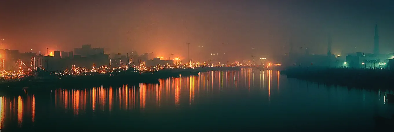 The creek at night, sodium lights along the waterfront